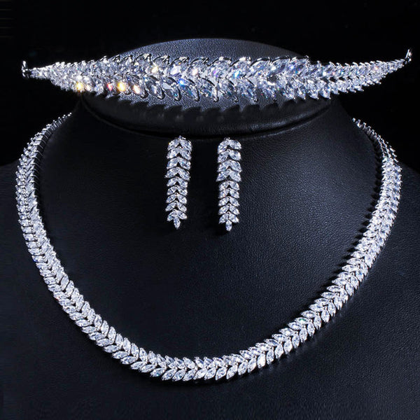 Hermosos conjuntos de collar, pendientes y tiara de boda con forma de hoja de circonita cúbica.