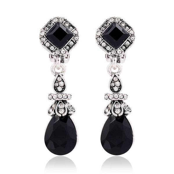 Pendientes de clip vintage de moda en color plata y negro, sin perforaciones.
