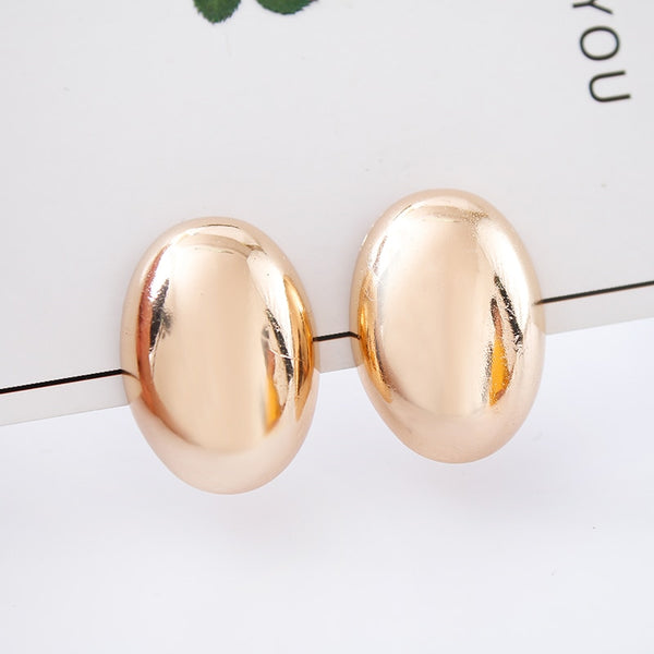 Pendientes elípticos de oro rosa con clip para oreja, para fiesta y club.