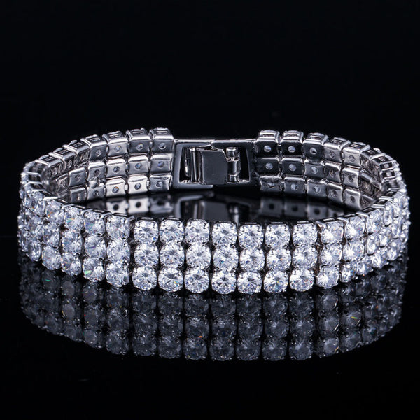 Pulsera grande con dije de circonita cúbica azul redonda de 3 filas para fiesta de graduación