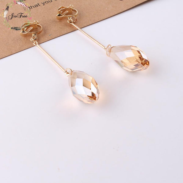 Pendientes largos de cristal con clip, modernos y sin perforar, para mujer.